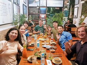 Happy customers savoring delicious vegan dishes at Phuong Mai Vegan Restaurant