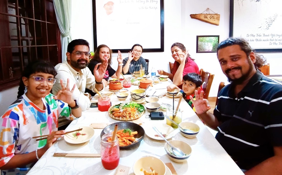 Tourists discovering traditional Vietnamese vegetarian cuisine at Phương Mai restaurant