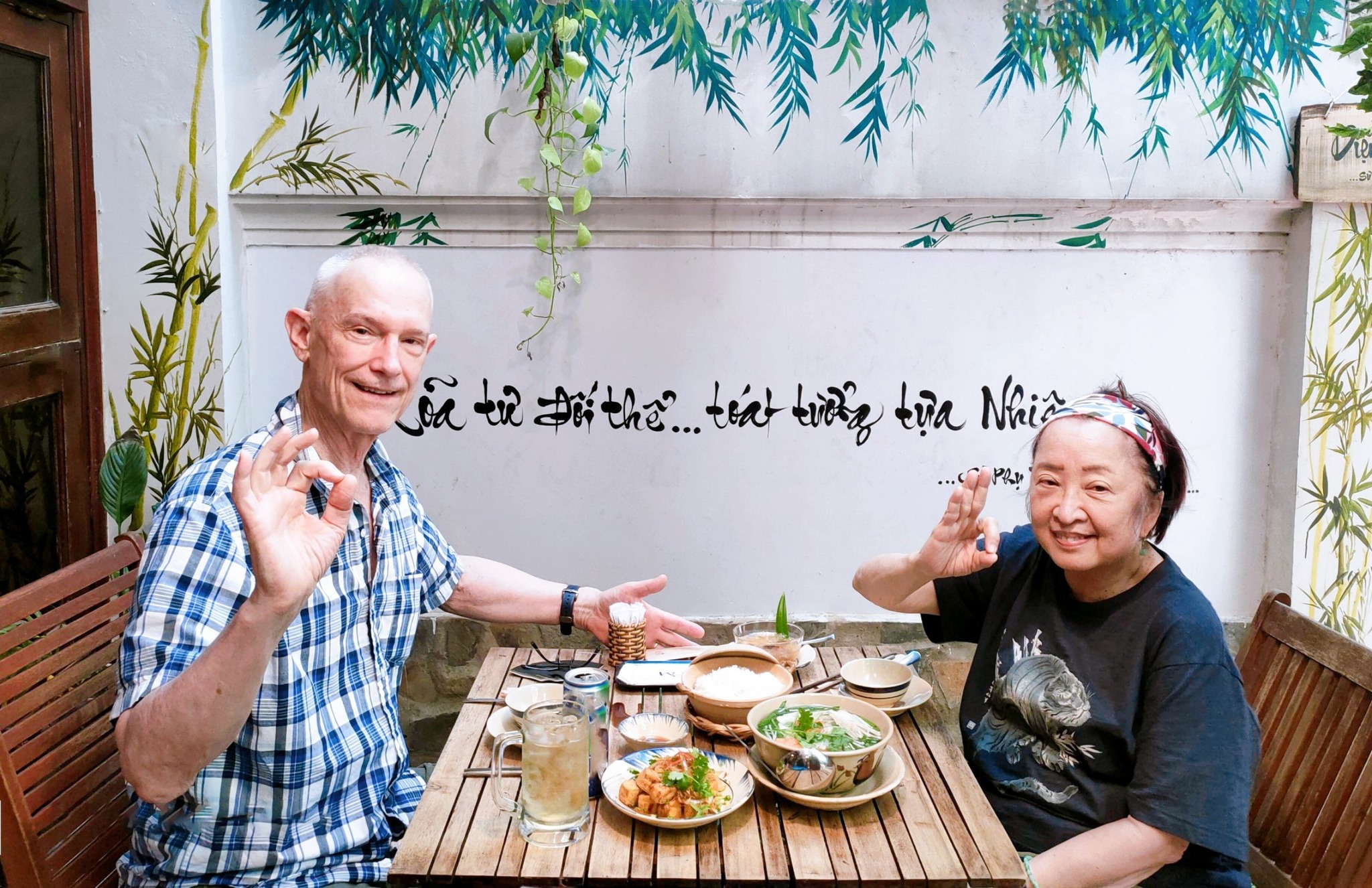 Foreign travelers enjoying a peaceful vegan dining moment in Ho Chi Minh City
