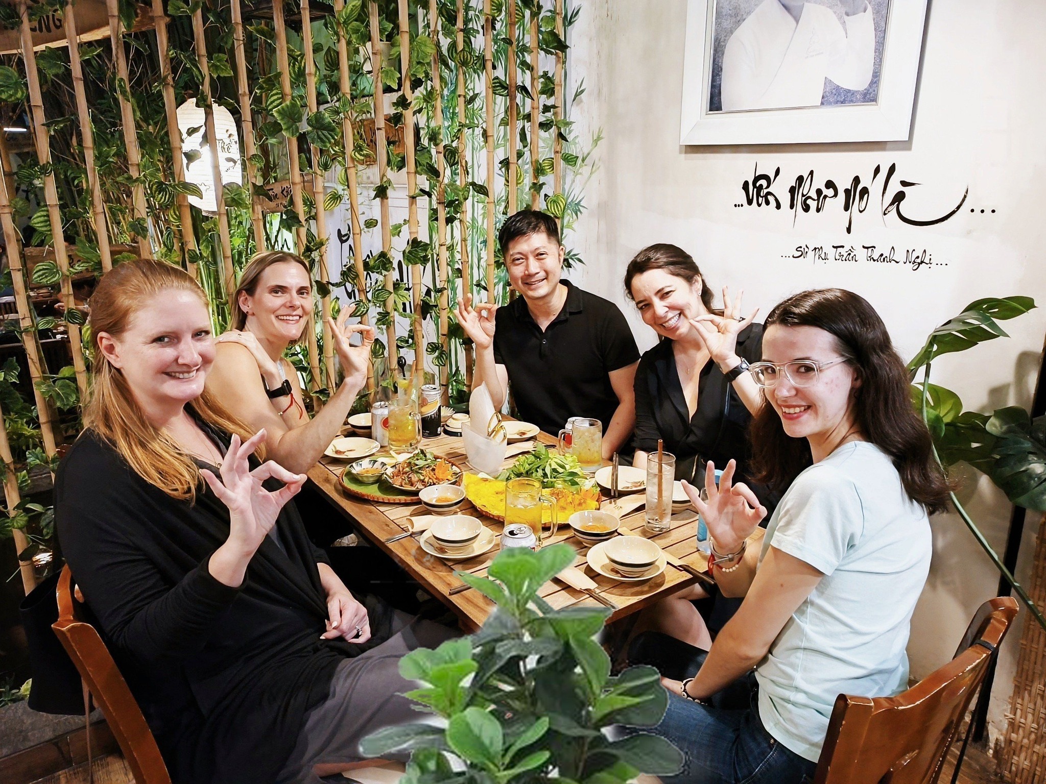Foreign Travelers Enjoying Vegetarian Cuisine at Nhà hàng chay Phương Mai International diners expressing satisfaction after enjoying vegetarian cuisine at Phương Mai
