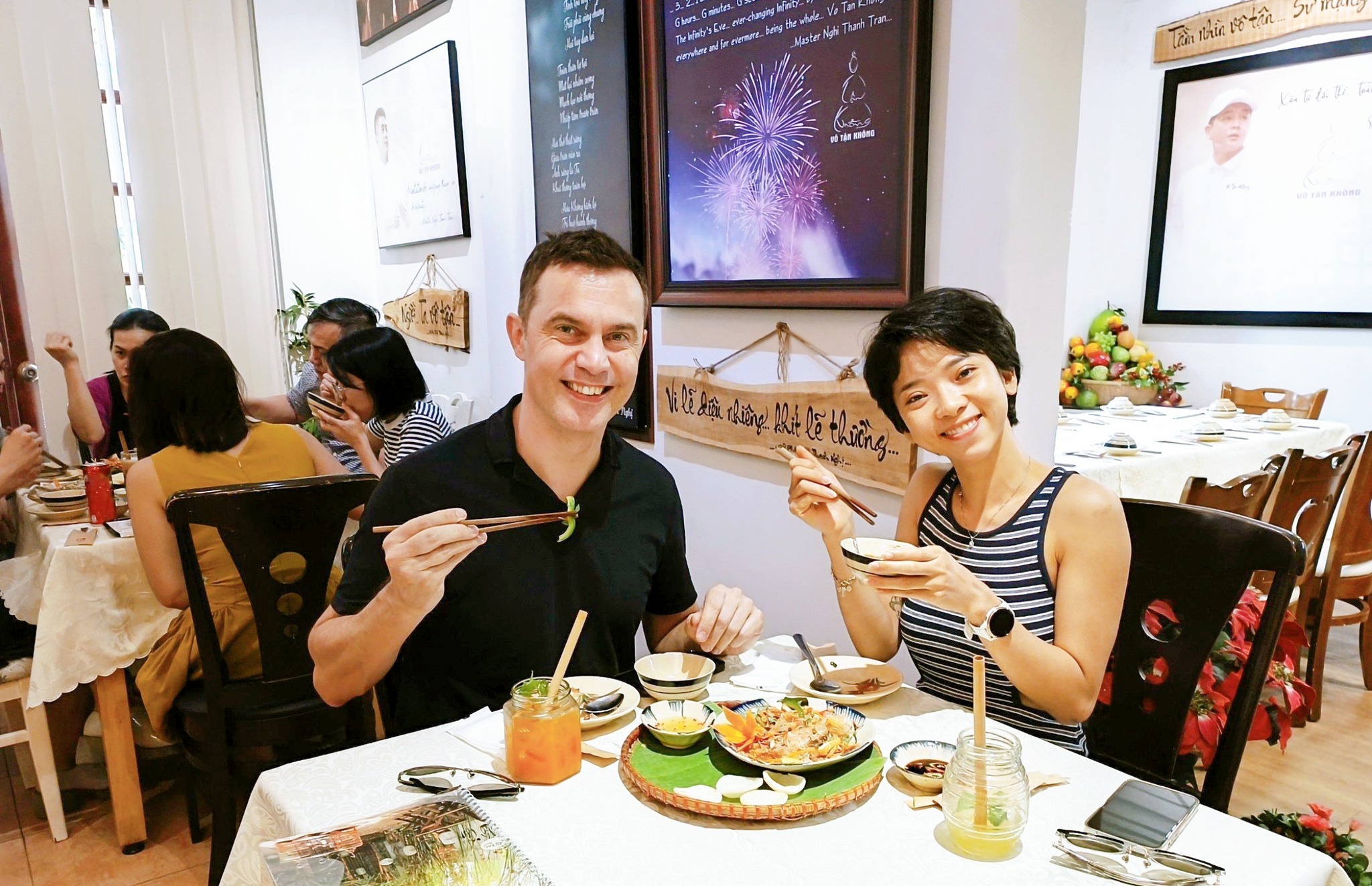 Authentic Vietnamese Vegetarian Food Loved by Foreign Visitors Foreign visitors sharing traditional Vietnamese vegetarian dishes at Nhà hàng chay Phương Mai
