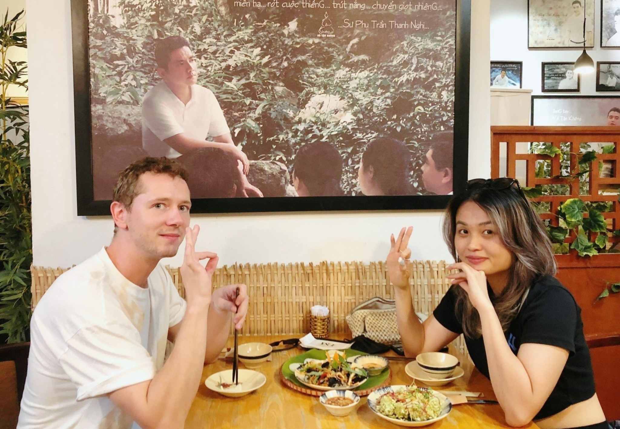 Foreign Diners Enjoying Traditional Plant Based Dishes in Ho Chi Minh City Travelers discovering authentic Vietnamese vegetarian cuisine at Nhà hàng chay Phương Mai