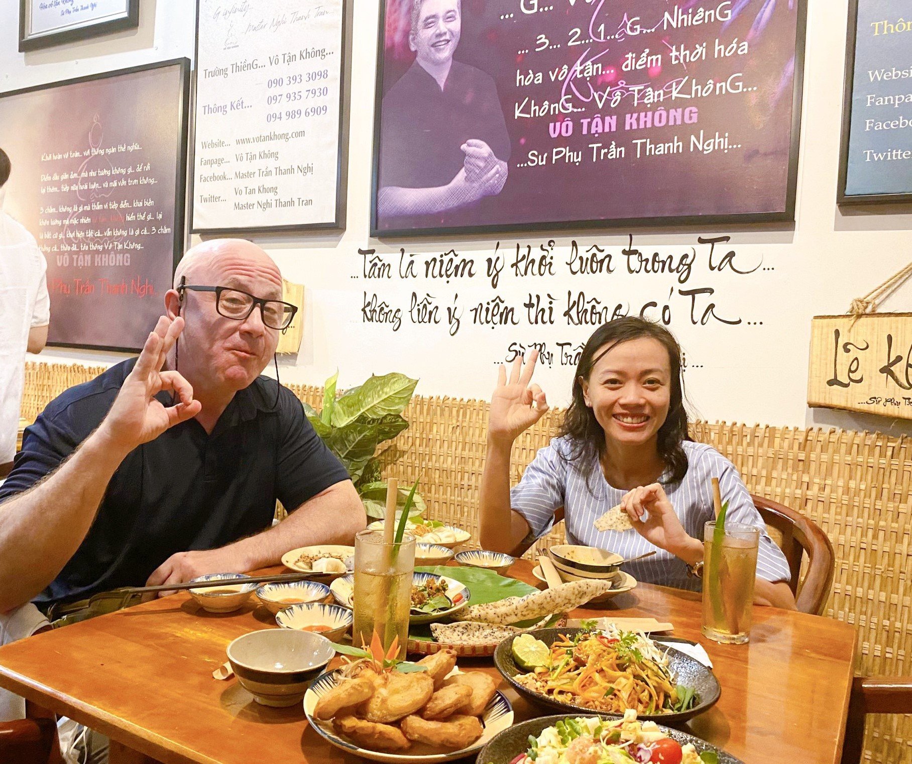 International visitors experiencing traditional vegan Vietnamese cuisine in Ho Chi Minh City