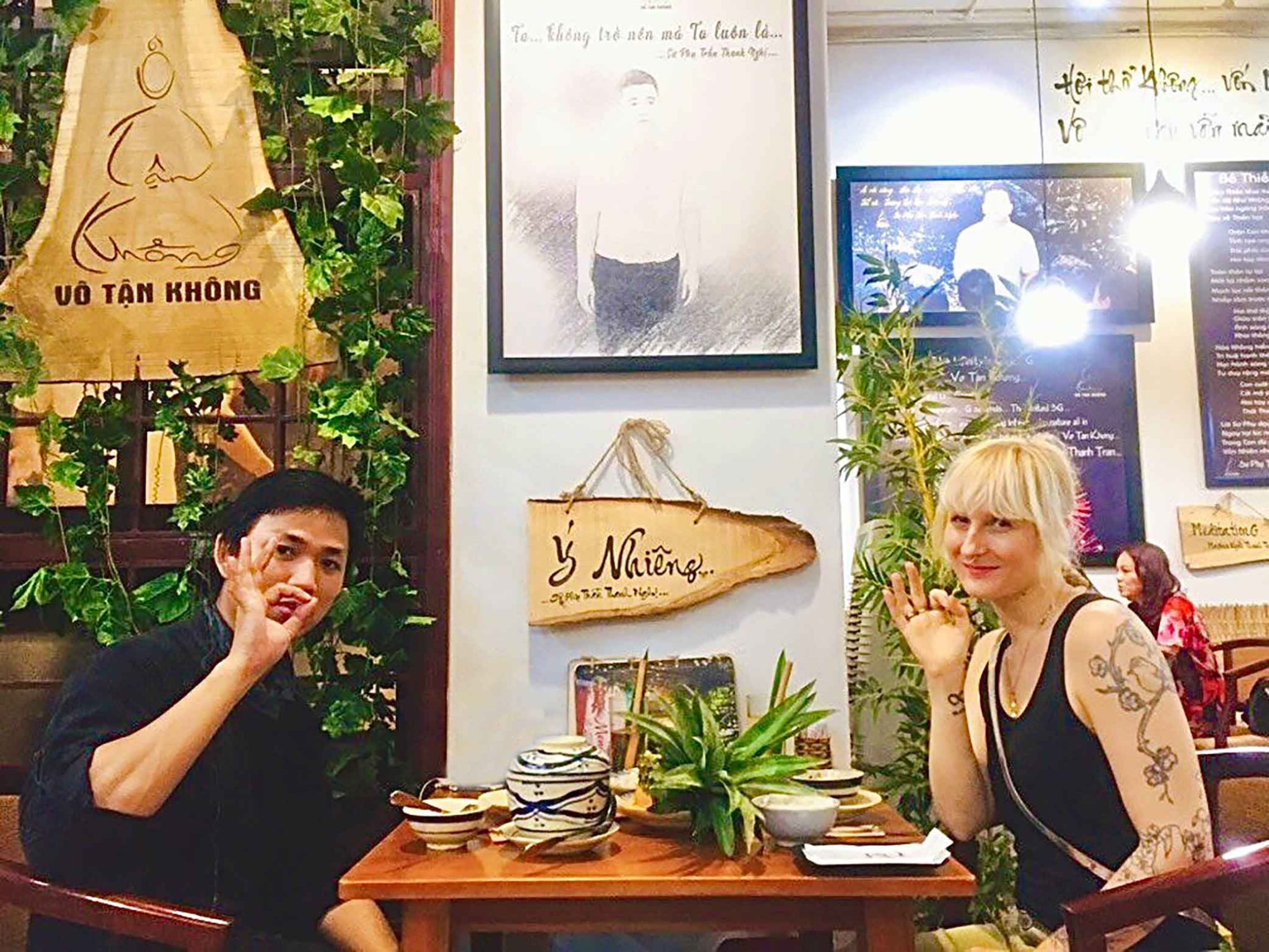 Travelers discovering a peaceful vegetarian dining experience in Saigon Vietnam