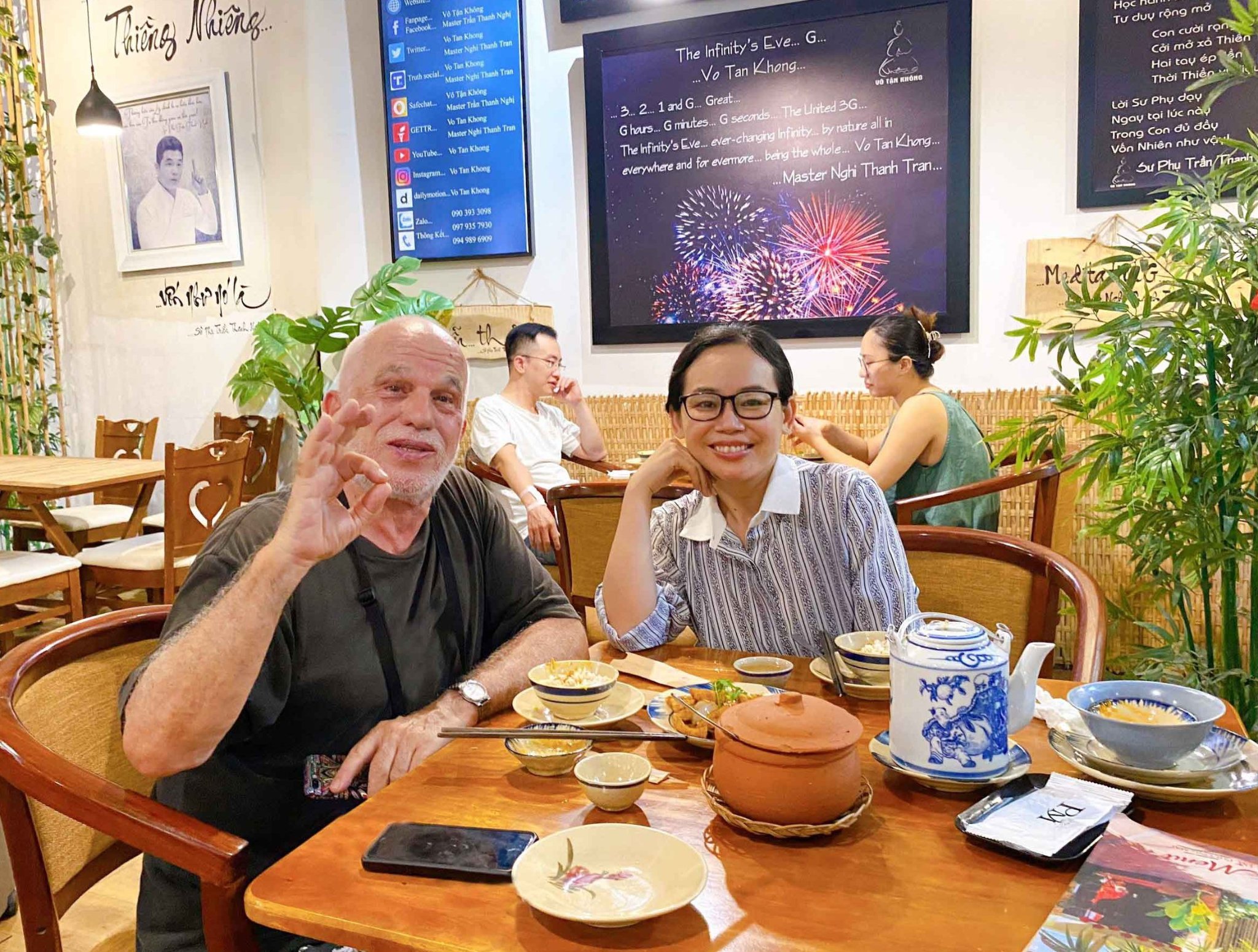 Foreign customers sharing joyful moments over colorful vegetarian food in Ho Chi Minh City