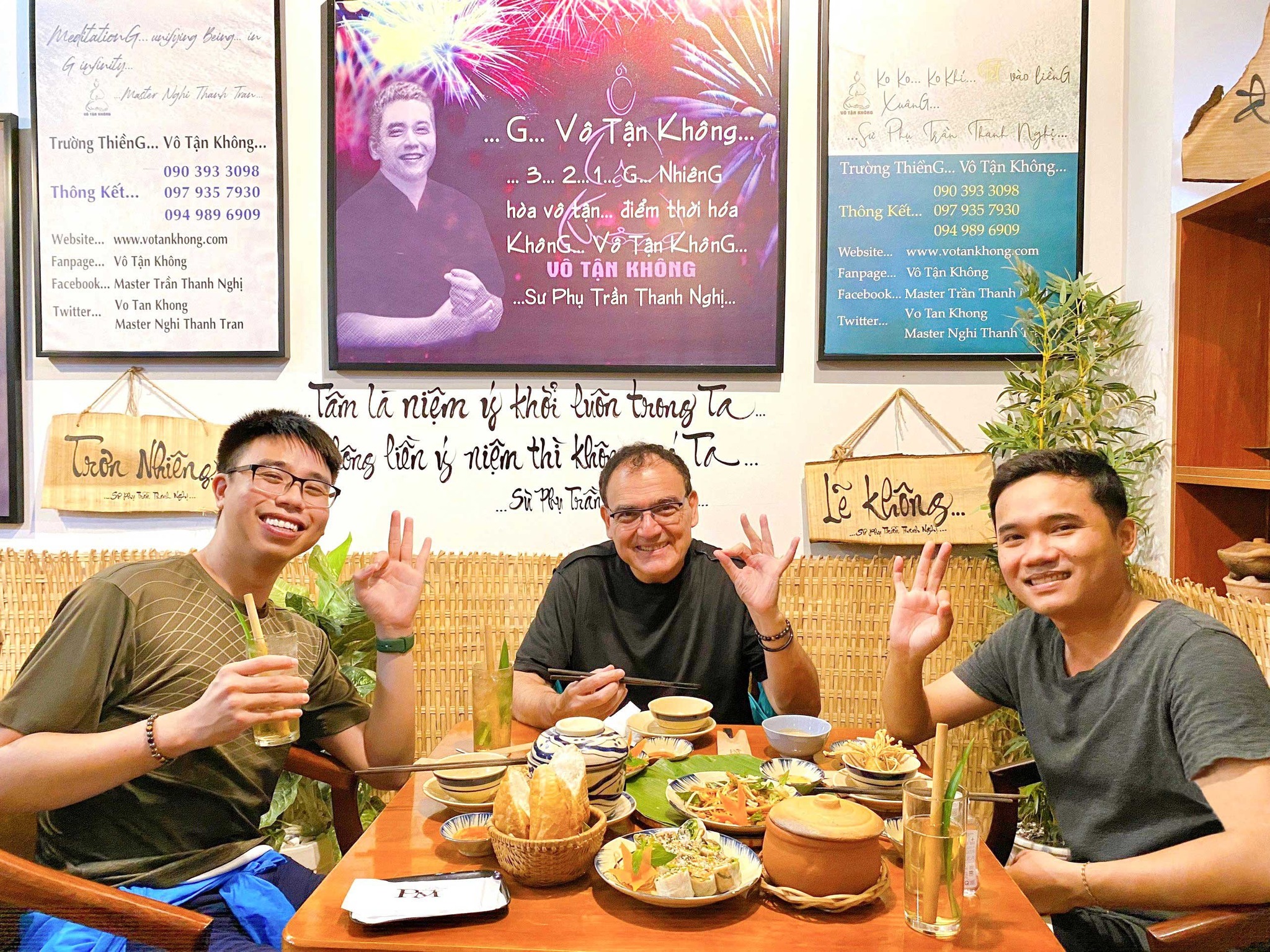 Happy international guests enjoying authentic Vietnamese vegetarian food at Phuong Mai Restaurant in Ho Chi Minh City