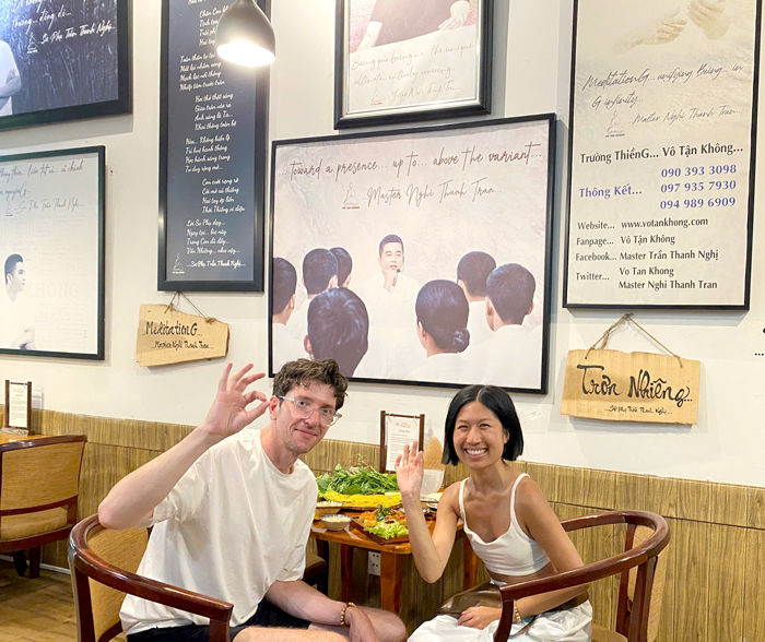 Foreign guests smiling at plant-based restaurant Ho Chi Minh City