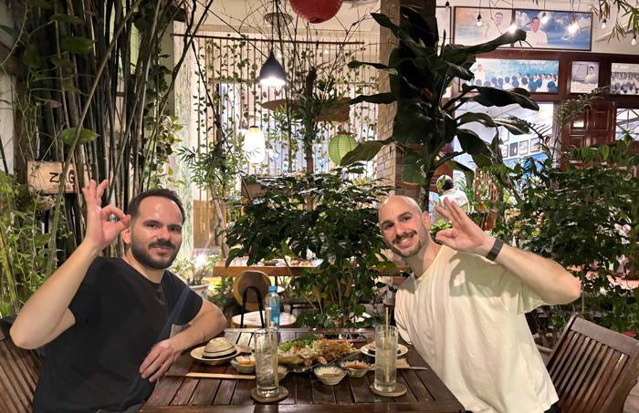 Tourists from overseas having a vegetarian meal in Vietnam.
