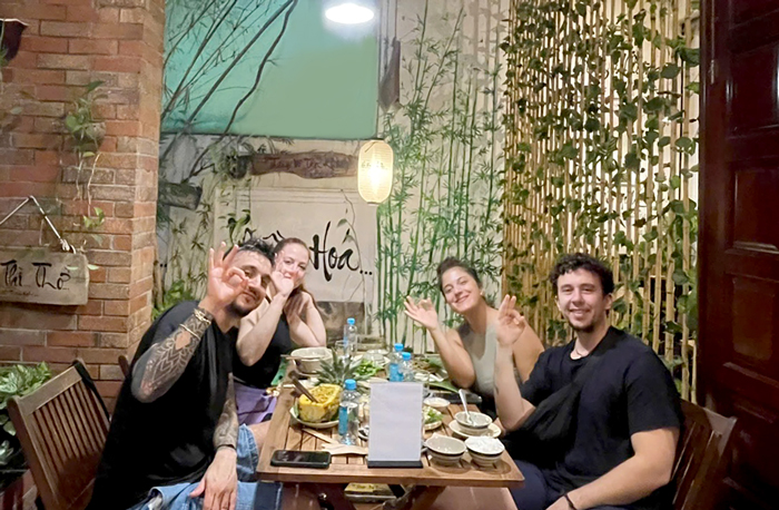Foreign customers dining at a popular vegetarian restaurant in District 1, Ho Chi Minh City.