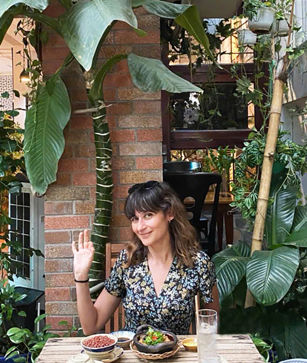 Tourists experiencing Vietnamese vegetarian cuisine at Phuong Mai Vegetarian Restaurant.