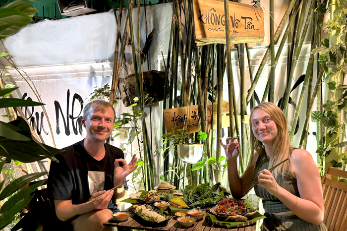 International guests enjoying relaxed vegan meals