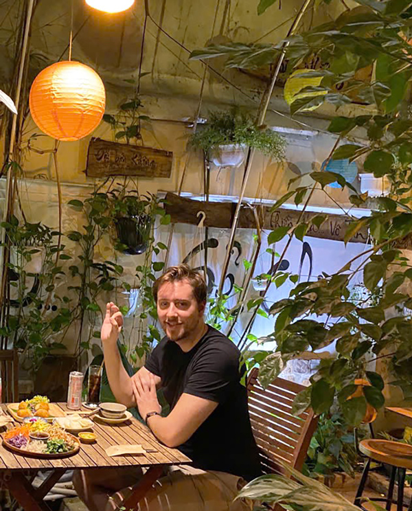 Happy foreign guests after dining at Phuong Mai Vegetarian Restaurant, District 1.