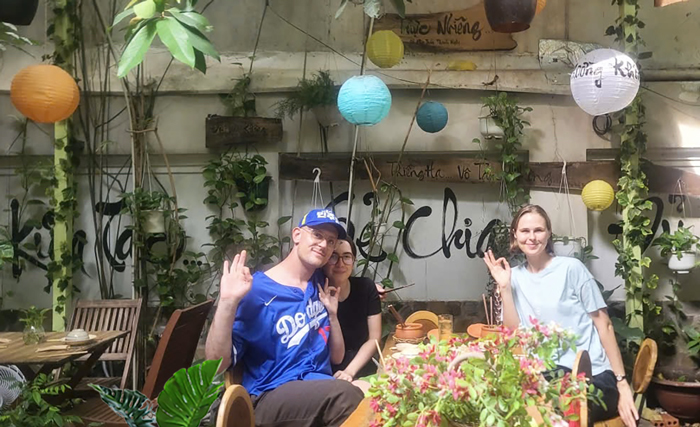International visitors dining at Phuong Mai Vegetarian Restaurant in Saigon.