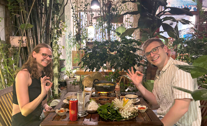 International guests sharing vegan dishes in Ho Chi Minh City