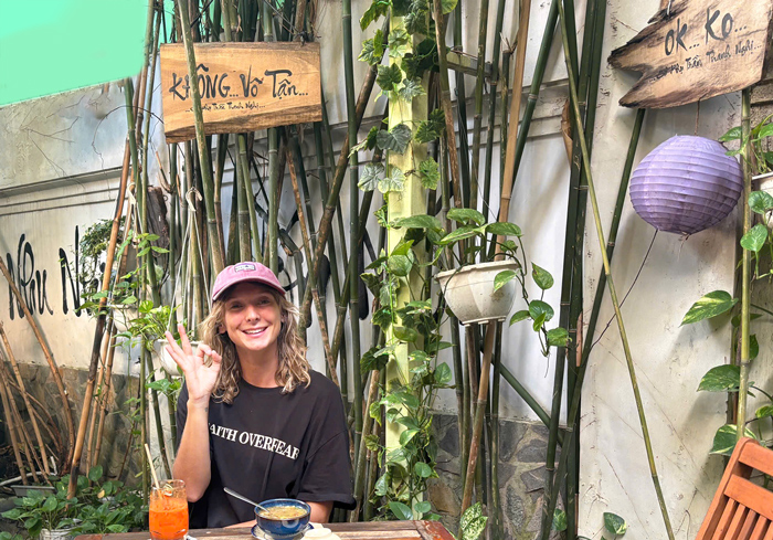 Foreign visitors dining at a vegan-friendly restaurant in Ho Chi Minh City.