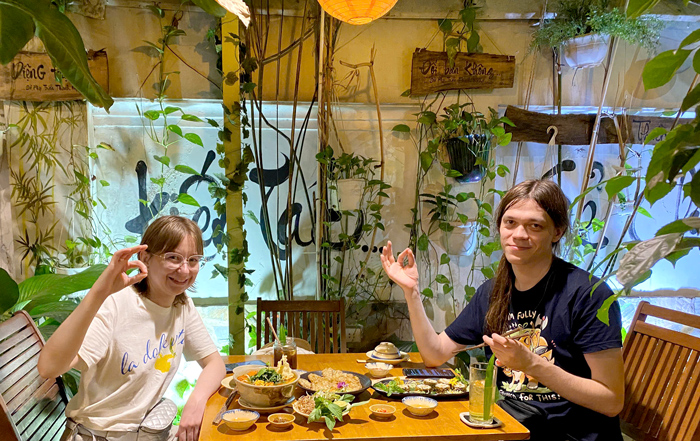 International guests enjoying best vegan food in Saigon
