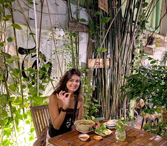 International visitors enjoying vegan food together