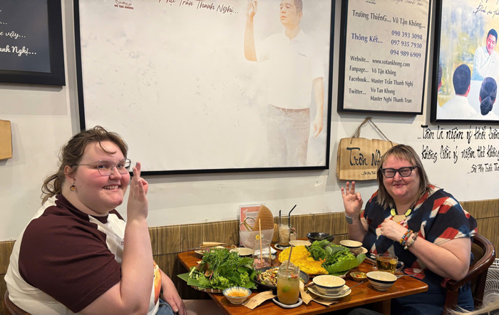 Foreign visitors discovering vegan Vietnamese cuisine