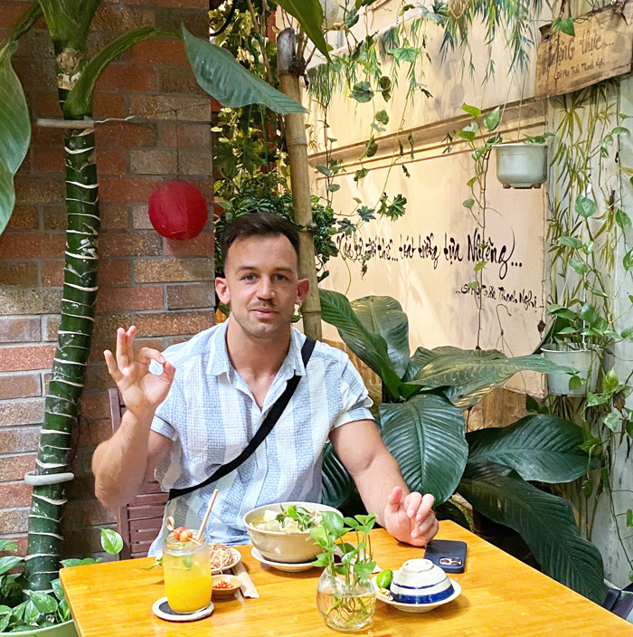 Foreign guests enjoying Vietnamese vegan flavors