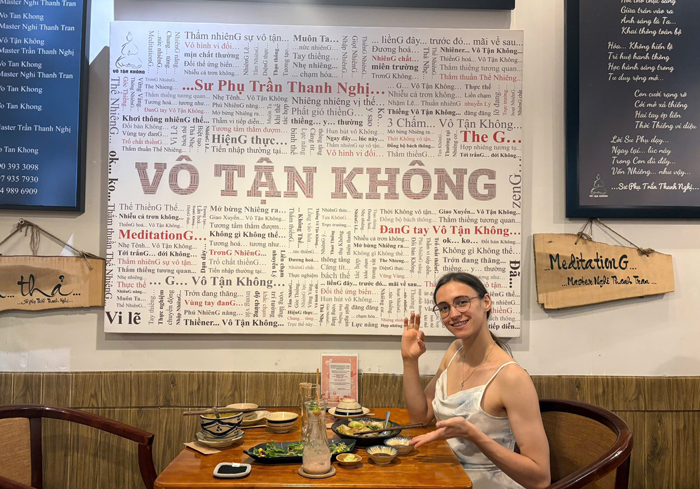 Foreign visitors experiencing Vietnamese vegan cuisine at Phuong Mai