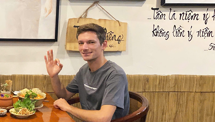 Tourists exploring Vietnamese vegan food at Phuong Mai