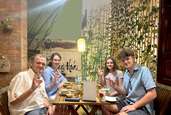 International guests seated for vegetarian dining at Phuong Mai.