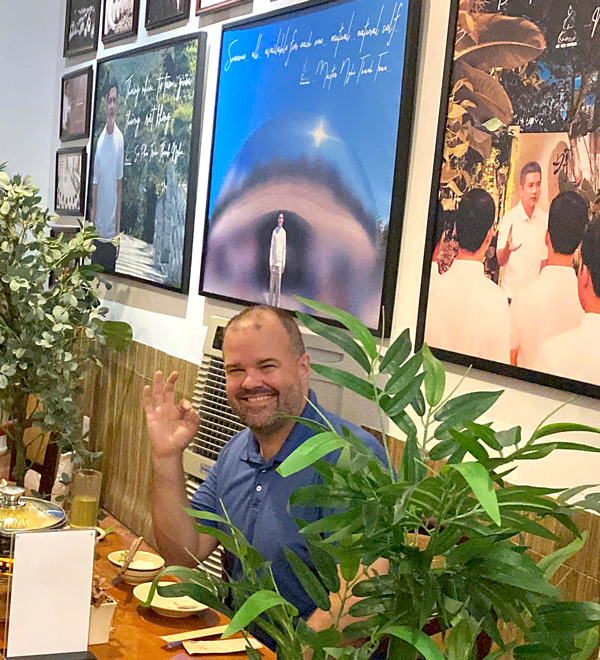 Foreign guests dining together at Phuong Mai Vegan Restaurant