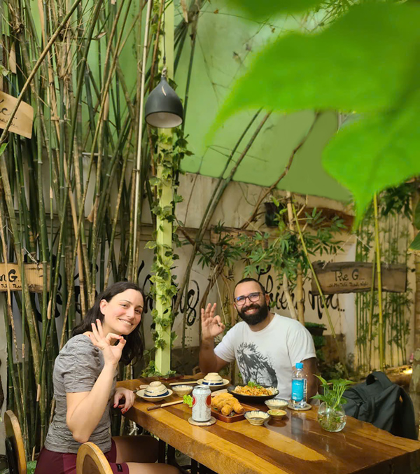 Foreign tourists eating Vietnamese vegetarian dishes at Phuong Mai.