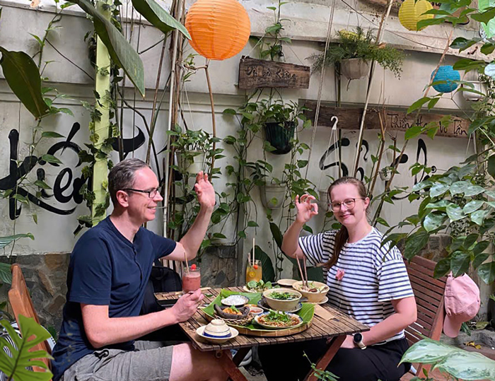 Foreign guests enjoying plant-based meals in a central Ho Chi Minh City restaurant.
