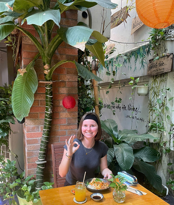 Tourists enjoying healthy vegan dining in Vietnam