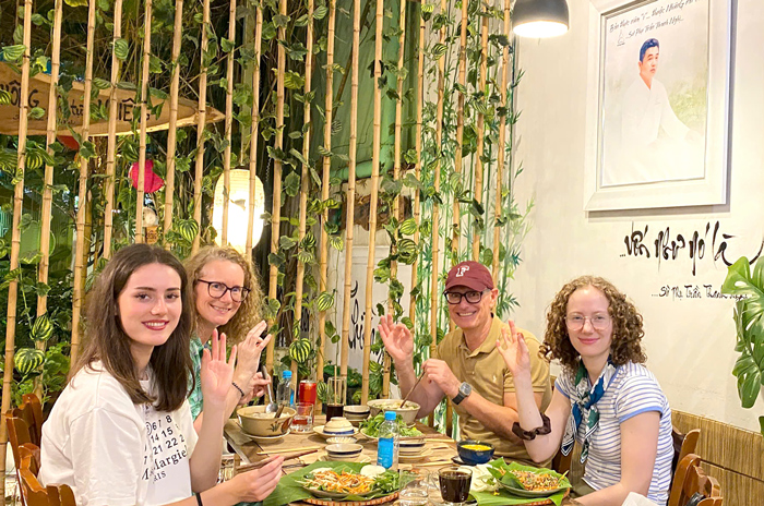 Tourists taking pictures at vegetarian restaurant in District 1 Saigon