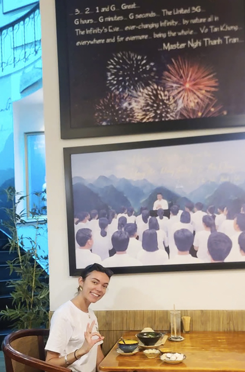 Foreign visitors enjoying vegetarian cuisine at a local Saigon restaurant.