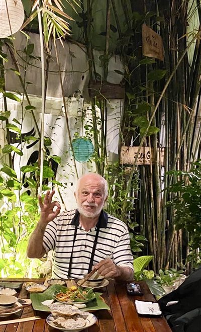 International guests enjoying Vietnamese vegetarian food in central Saigon.